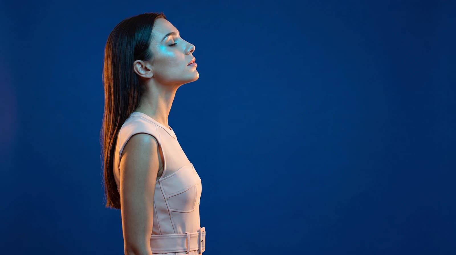 Editorial fashion portrait with split warm-cool gel lighting